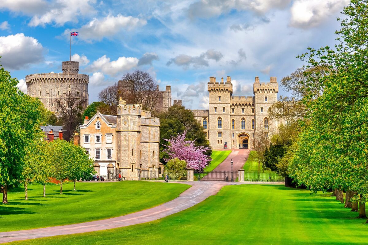 Windsor Castle: A magnificent royal residence with historic architecture and lush surroundings, located in Windsor, England.