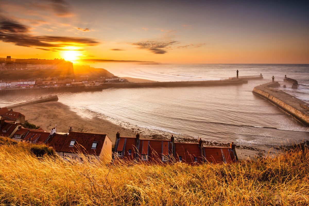 Whitby Beach: A serene and picturesque sandy beach along the North Yorkshire coast, overlooking the North Sea.