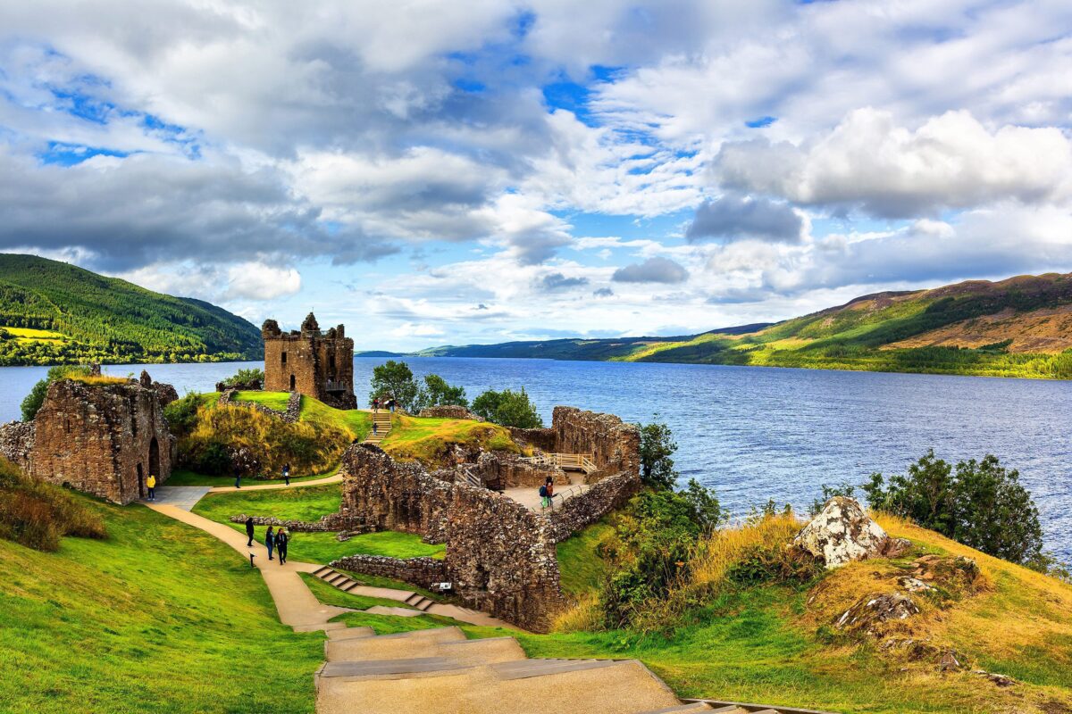 Loch Ness: A mesmerizing Scottish loch shrouded in mist, known for its mystique and legendary Loch Ness Monster.
