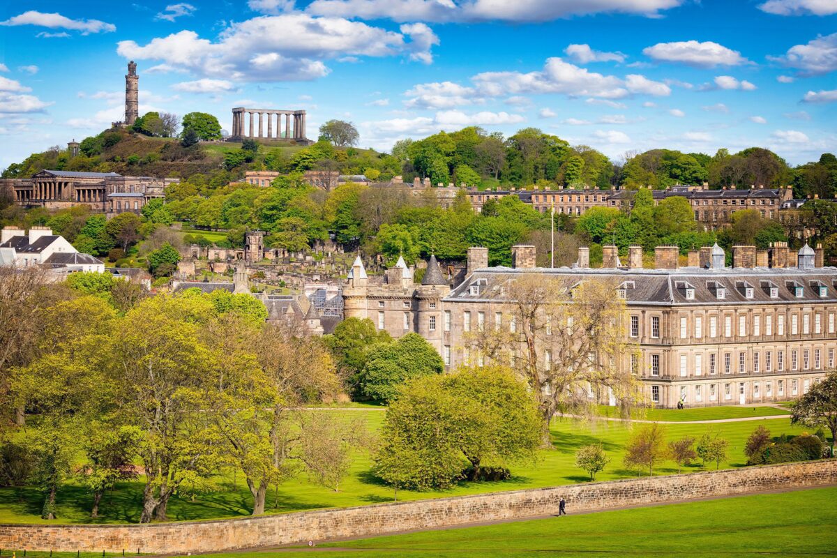 Palace of Holyroodhouse: A historic royal residence with magnificent architecture and scenic gardens in Edinburgh, Scotland.