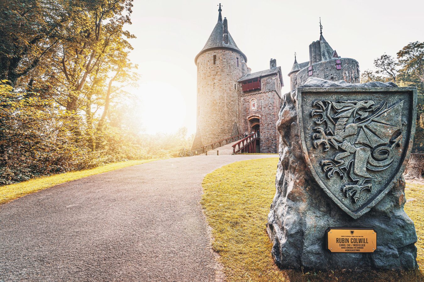 Castle Coch and a dragon monolith in Cardiff, UK